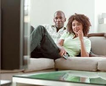 black_couple_watching_tv.jpg