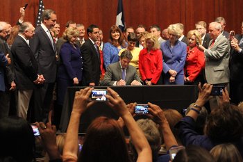 Rick_Perry_signs_Texas_abortion_law.jpg
