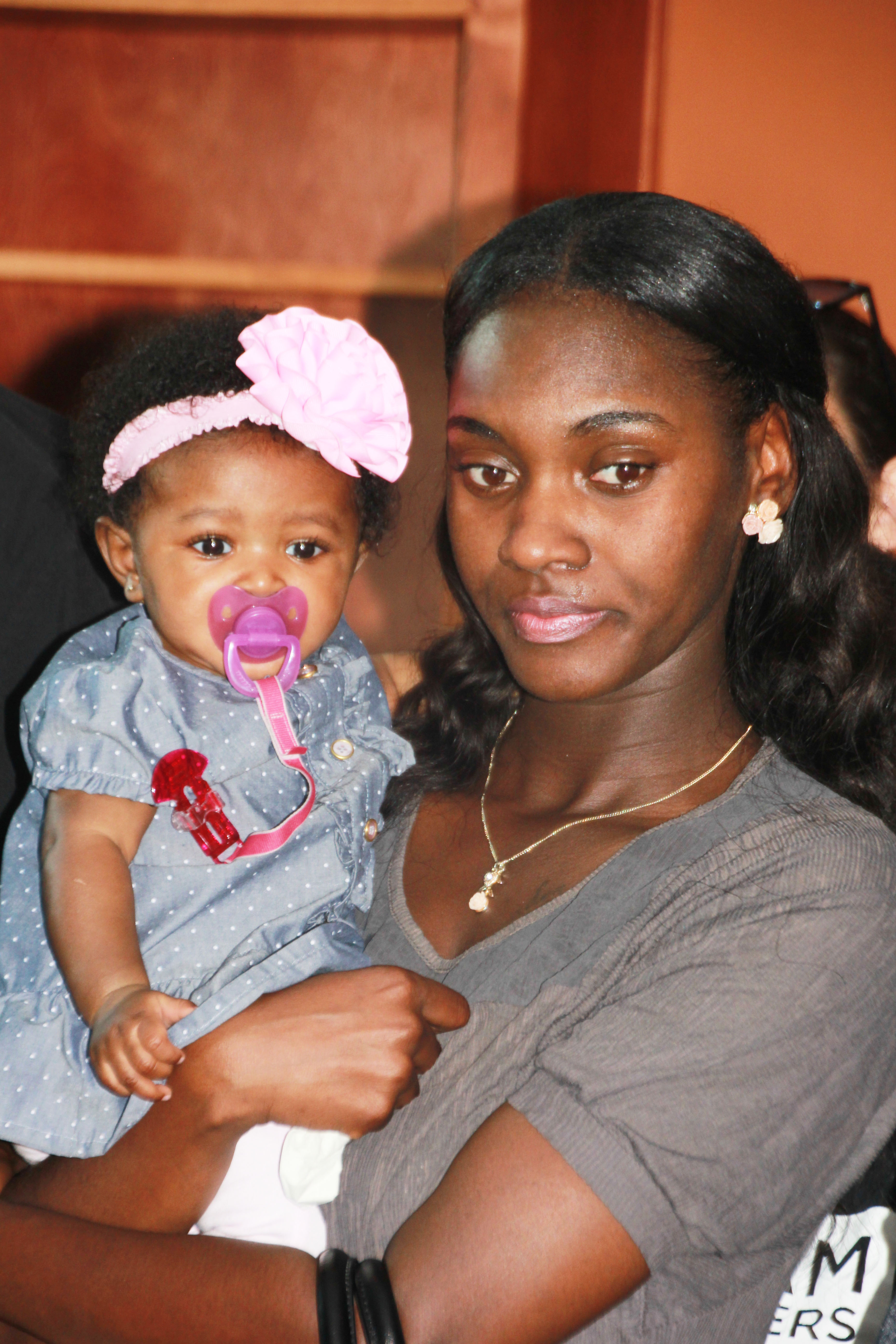 Nicholas Thomas' girlfriend, Cajun Snorton, and their 4-month-old daughter.