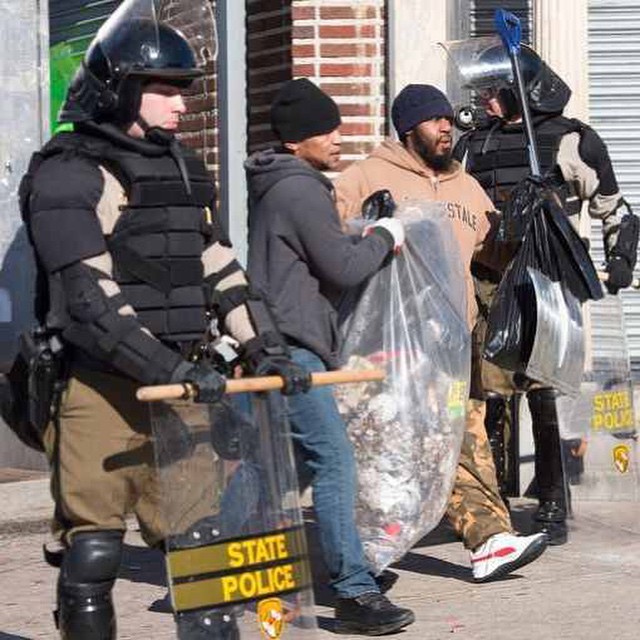 Citizens helping to clean up beleaguered Baltimore. 