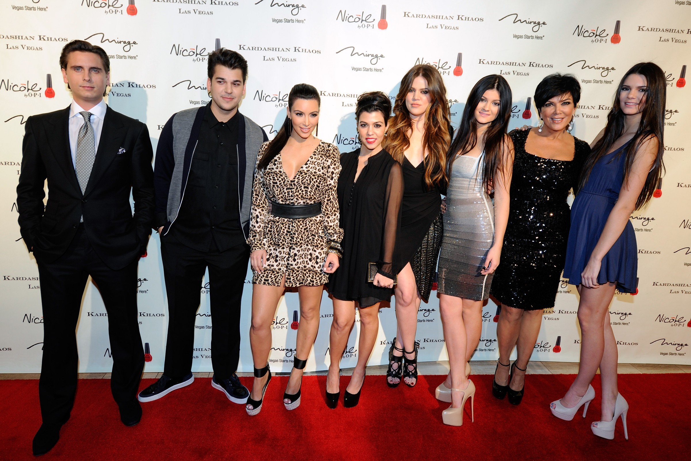 LAS VEGAS, NV - DECEMBER 15: (L-R) Television personalities Scott Disick, Robert Kardashian Jr., Kim Kardashian, Kourtney Kardashian, Khloe Kardashian, Kylie Jenner, Kris Jenner and Kendall Jenner arrive at the grand opening of the Kardashian Khaos store at the Mirage Hotel & Casino December 15, 2011 in Las Vegas, Nevada. (Photo by Ethan Miller/Getty Images)