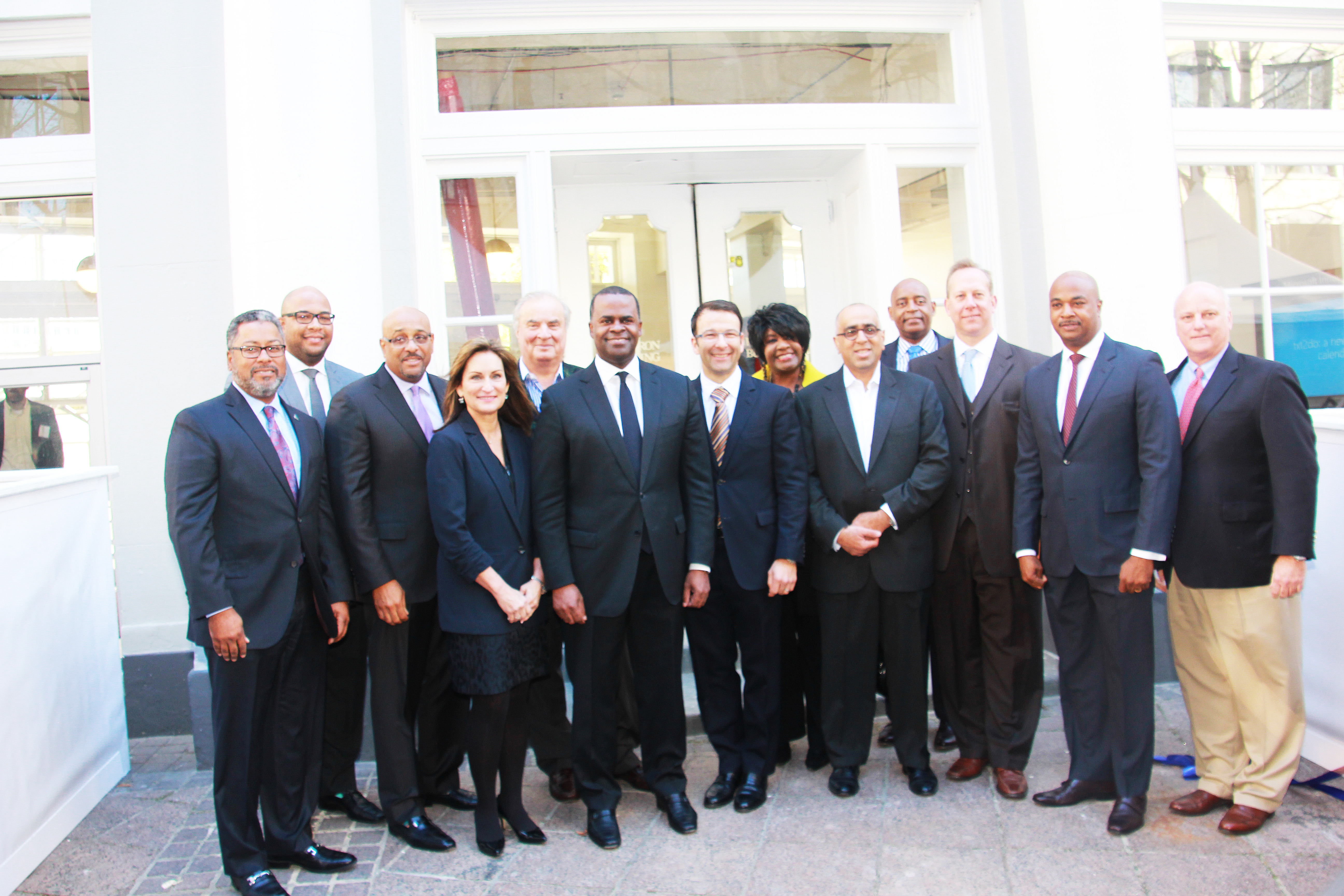 Mayor Kasim Reed is flanked by Microsoft executives and local dignitaries. (Photos by Terry Shropshire for Atlanta Daily World and Real Times Media). 