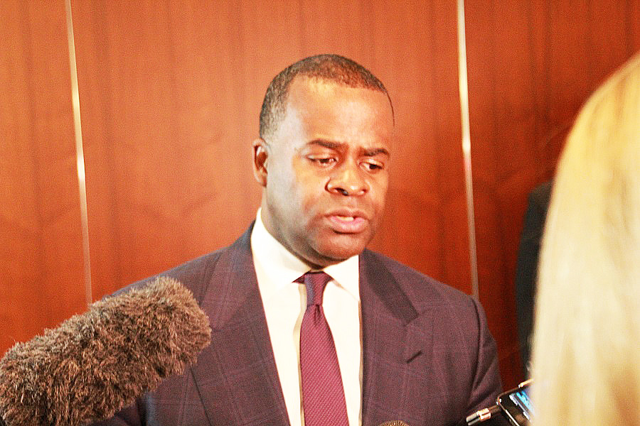 Mayor Kasim Reed addresses the media following a tour of InComm. (Photo by Terry Shropshire for Atlanta Daily World and Real Times Media). 