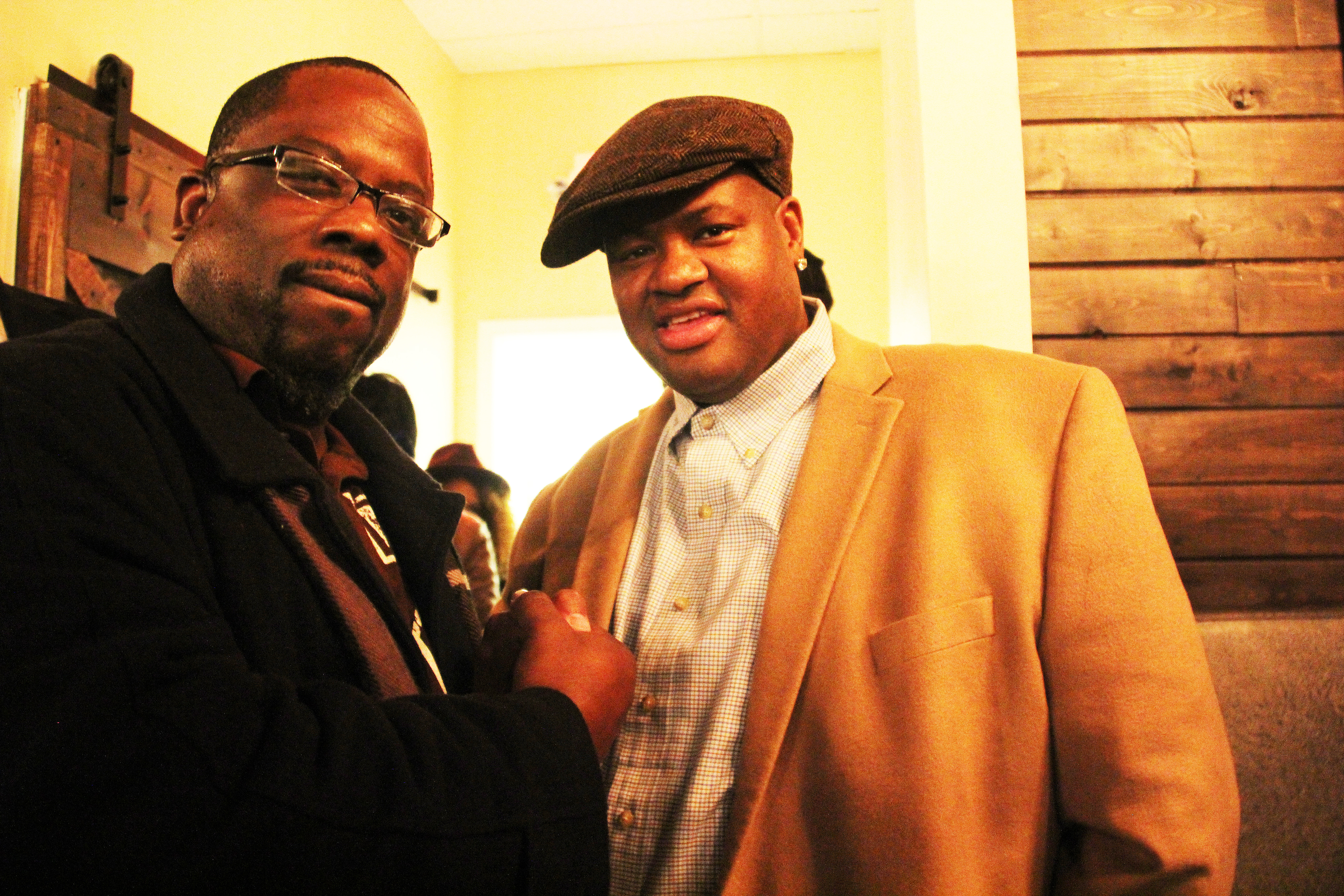 Atlanta Daily World Editor Terry Shropshire, left, with Vince Herbert at sister-in-law Trina's Bar Chix restaurant in metro Atlanta. 