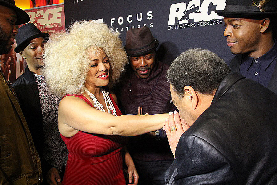 Ambassador Andrew Young kisses host Kim Field's hand at the Race movie premiere (Copyright photos taken by Terry Shropshire for Atlanta Daily World and Real Times Media). 