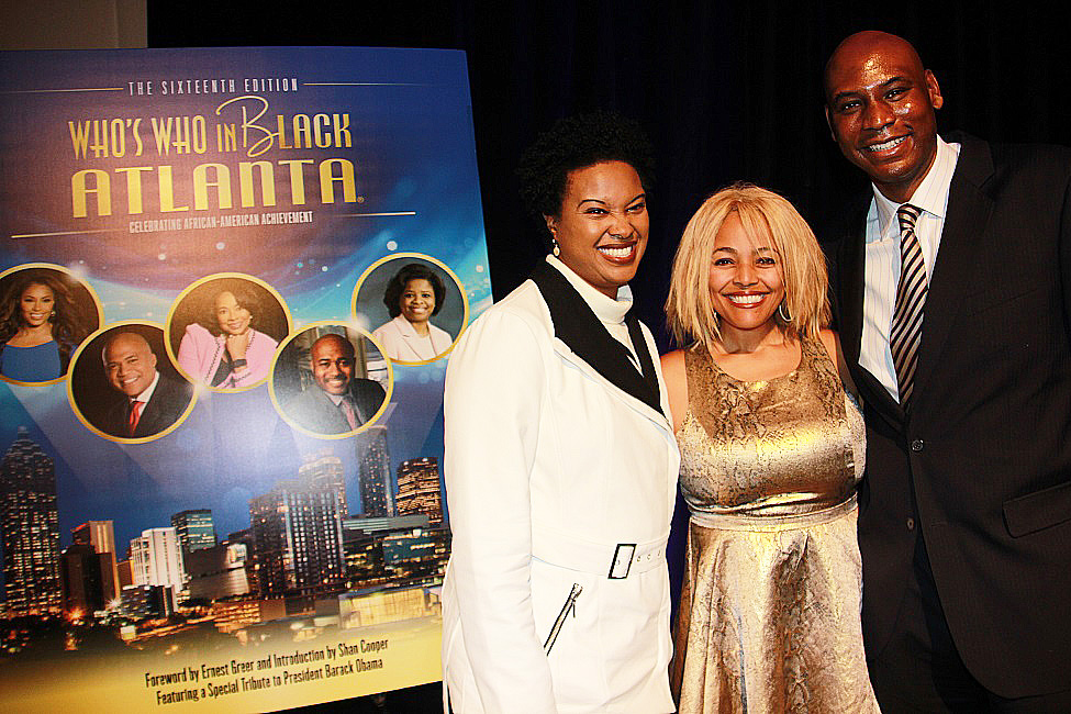 Kim Fields poses with Cricket Wireless VP George Cleveland and his wife Antonette. 
