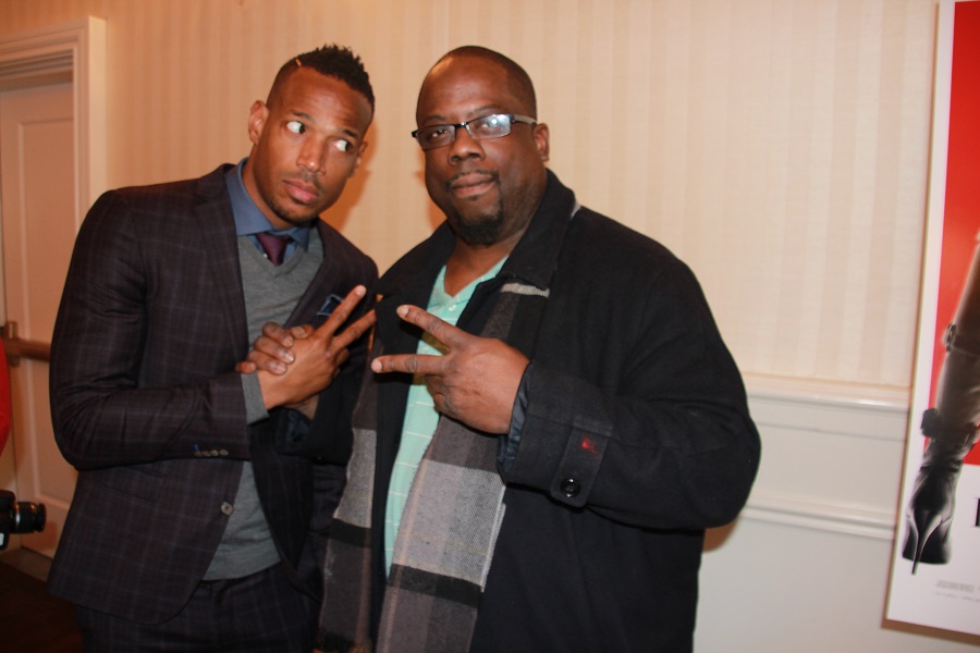 Marlon Wayans, left, clowns during the promotion of his latest film, "50 Shades of Black." 