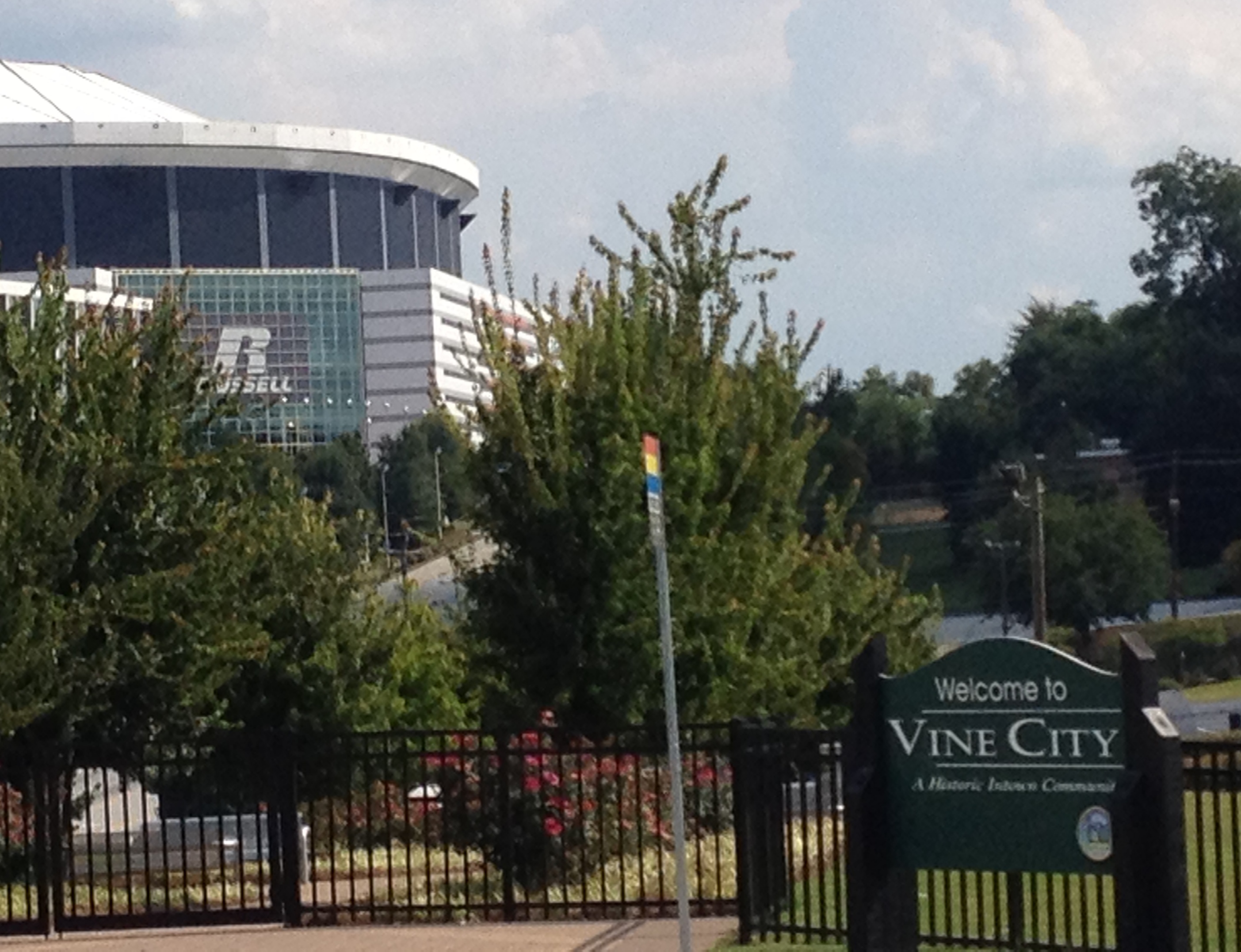 Vine_City_sign_with_Georgia_Dome_in_background
