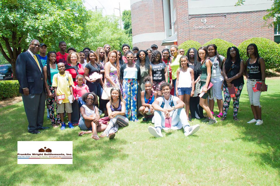 The Franklin Wright Settlements College Tour stops off to visit Clark Atlanta University and its president, Dr. Ronald A. Johnson, and his wife (Photos by Montez Miller). 