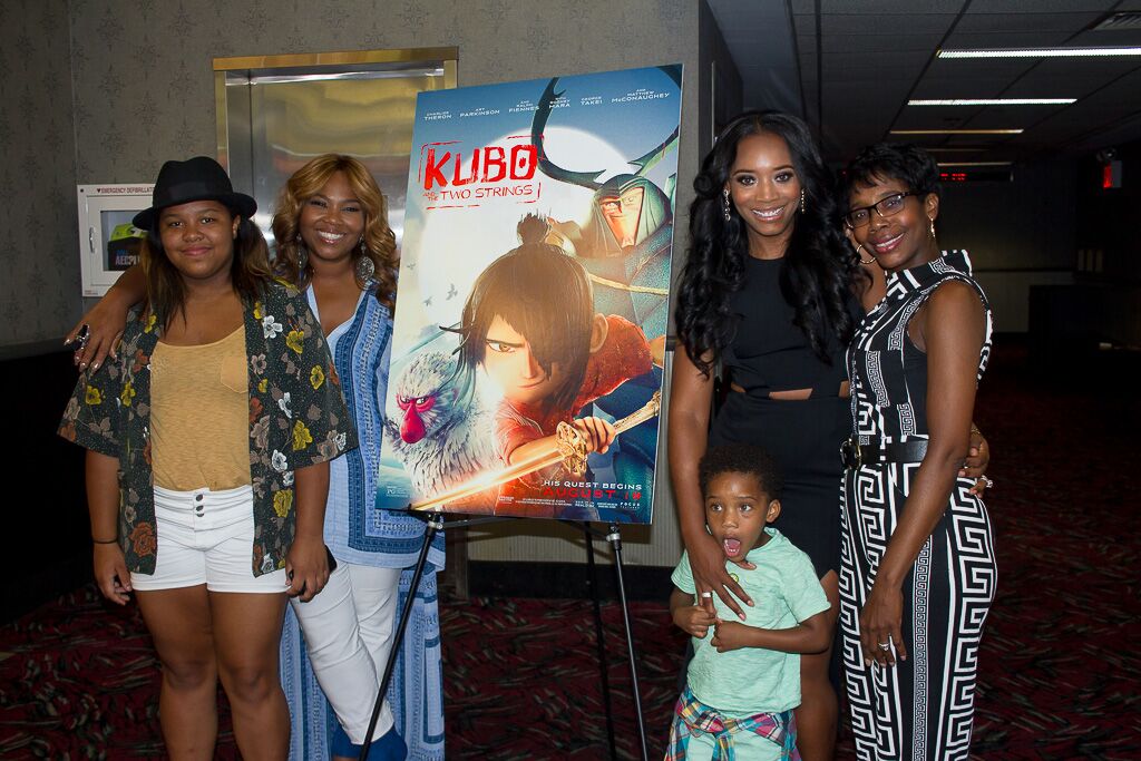 Producer Mona Scott Young with Yandy Harris and family. 
