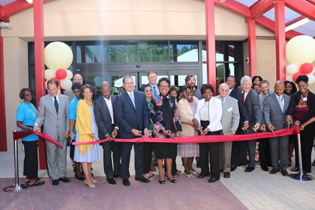 From Left: Elsie Fitzpatrick, Friends of South Fulton Library; Dick Anderson, County Manager, Fulton County Government; Ellis Kirby, Director, DREAM; Beverly Young, Friends of South Fulton Library; Cheryl McAfee, McAfee3 Architects; Eric Wilson, Heery International, Inc.; Chairman John H. Eaves (District 7, At-Large), Fulton County Board of Commissioners; A. Michelle Smith, Atlanta-Fulton Public Library Foundation Board Member; Todd Long, Chief Operating Officer, Fulton County Government; Commissioner Emma I. Darnell (District 6), Fulton County Board of Commissioners; Patricia McCord, Friends of South Fulton Library; Community Member; Dr. Gabriel Morley, Director, Atlanta-Fulton Public Library System; Phyllis D. Bailey, Vice Chairman, Library Board of Trustees; Paul Kaplan, Chairman, Library Board of Trustees; Alfred Collins, Assistant Director, Building Engineering/Library Projects, DREAM, Fulton County Government; David Kimmel, H.J. Russell and Company; Odessa Washington-Williams, Friends of South Fulton Library; Charissa Reedy, Friends of South Fulton Library; Councilman Brian K. Jones, Union City Council; Lionell Thomas, Director, Fulton County Arts and Culture; Aleisha Sawyer, Friends of South Fulton Library; Keisha Kent-Sawyer, President, Friends of South Fulton Library.