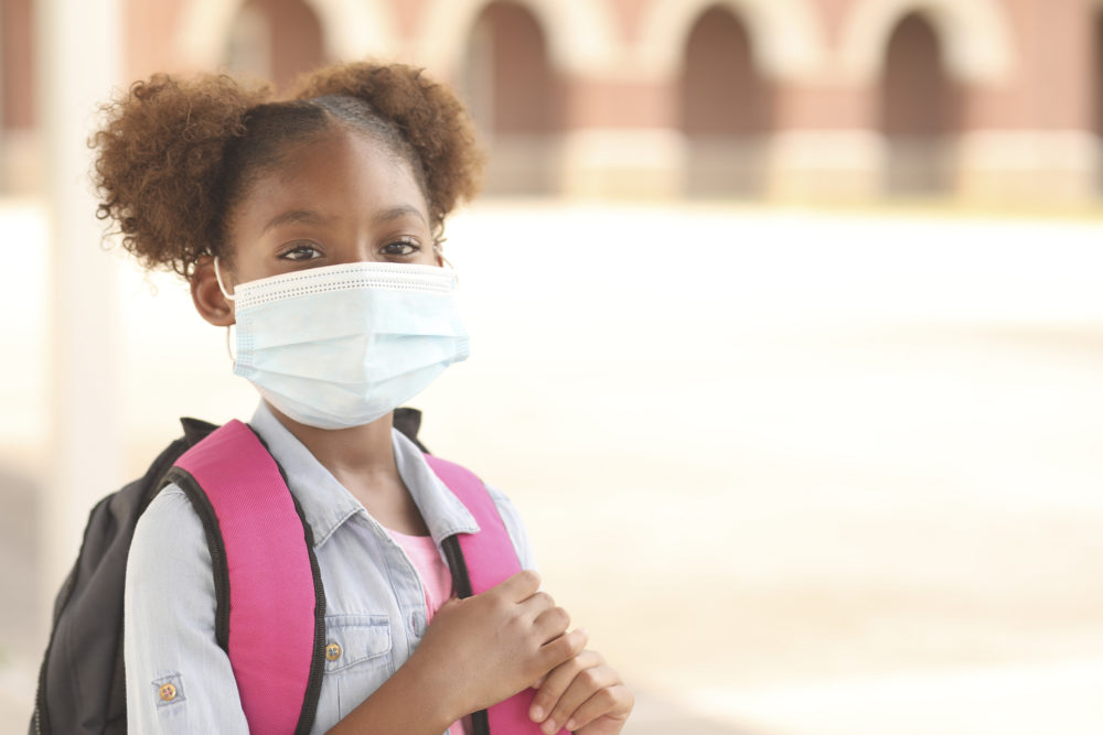 Atlanta Daily World student with mask